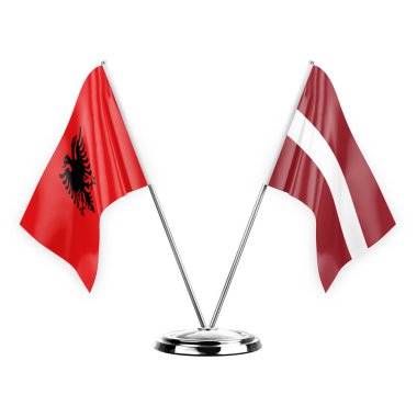 Two table flags isolated on white background 3d illustration, albenia and latvia