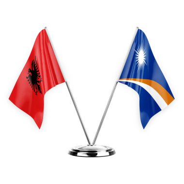 Two table flags isolated on white background 3d illustration, albenia and marshall islands