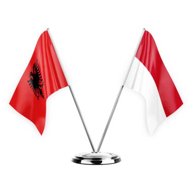 Two table flags isolated on white background 3d illustration, albenia and monaco
