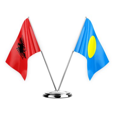 Two table flags isolated on white background 3d illustration, albenia and palau