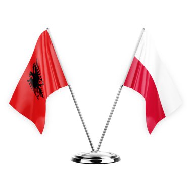 Two table flags isolated on white background 3d illustration, albenia and poland