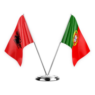 Two table flags isolated on white background 3d illustration, albenia and portugal