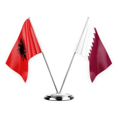 Two table flags isolated on white background 3d illustration, albenia and qatar