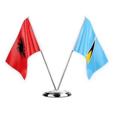 Two table flags isolated on white background 3d illustration, albenia and saint lucia