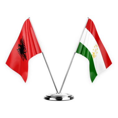 Two table flags isolated on white background 3d illustration, albenia and tajikistan