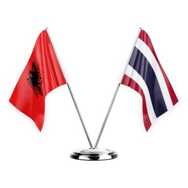 Two table flags isolated on white background 3d illustration, albenia and thailand