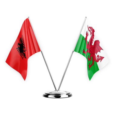 Two table flags isolated on white background 3d illustration, albenia and wales