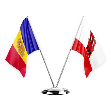 Two table flags isolated on white background 3d illustration, andorra and gibraltar