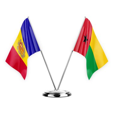 Two table flags isolated on white background 3d illustration, andorra and guinea-bissau
