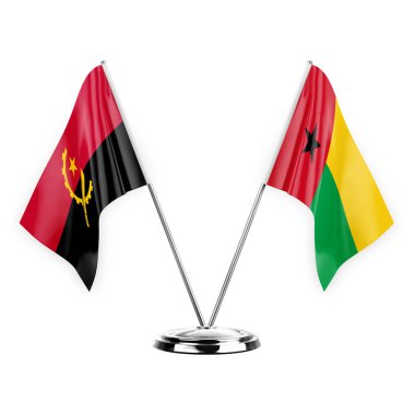 Two table flags isolated on white background 3d illustration, angola and guinea-bissau