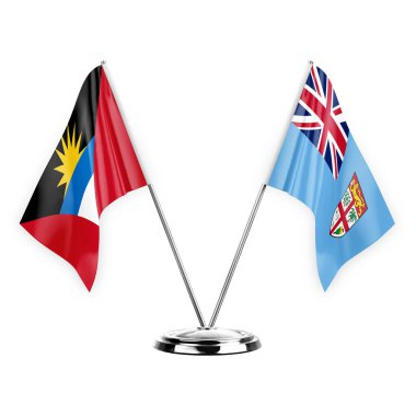 Two table flags isolated on white background 3d illustration, antigua barbuda and fiji
