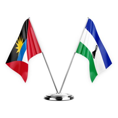 Two table flags isolated on white background 3d illustration, antigua barbuda and lesotho