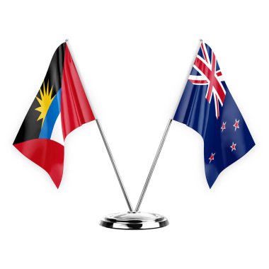 Two table flags isolated on white background 3d illustration, antigua barbuda and new zealand