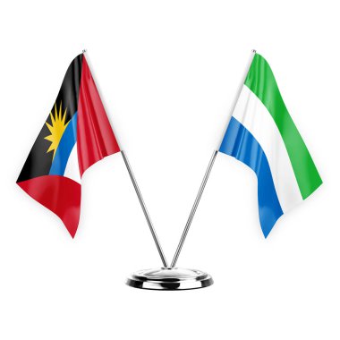 Two table flags isolated on white background 3d illustration, antigua barbuda and sierra leone