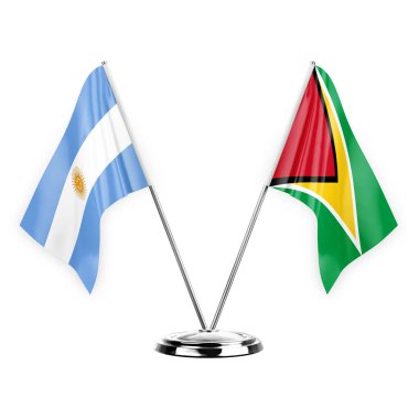 Two table flags isolated on white background 3d illustration, argentina and guyana