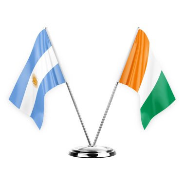 Two table flags isolated on white background 3d illustration, argentina and ivory coast