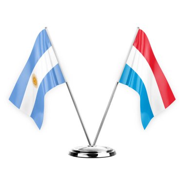 Two table flags isolated on white background 3d illustration, argentina and luxembourg
