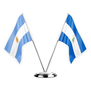 Two table flags isolated on white background 3d illustration, argentina and nicaragua