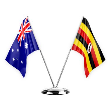 Two table flags isolated on white background 3d illustration, australia and uganda