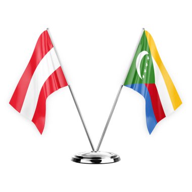 Two table flags isolated on white background 3d illustration, austria and comoros