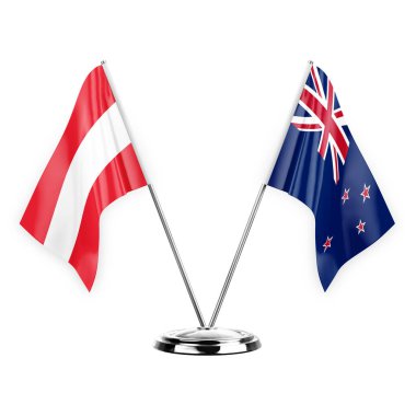 Two table flags isolated on white background 3d illustration, austria and new zealand
