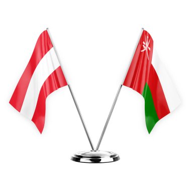 Two table flags isolated on white background 3d illustration, austria and oman