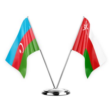 Two table flags isolated on white background 3d illustration, azerbaijan and oman