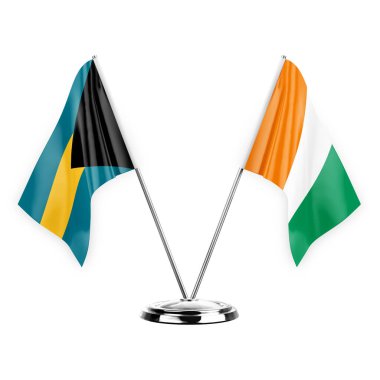 Two table flags isolated on white background 3d illustration, bahamas and ivory coast