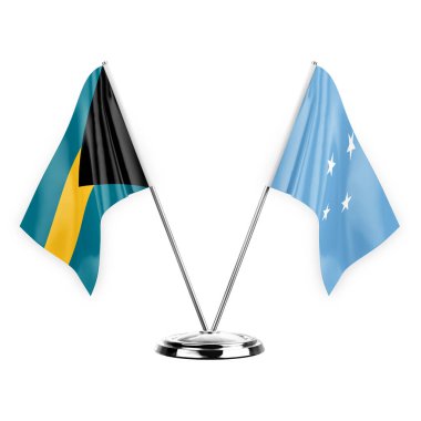 Two table flags isolated on white background 3d illustration, bahamas and micronesia