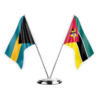 Two table flags isolated on white background 3d illustration, bahamas and mozambique