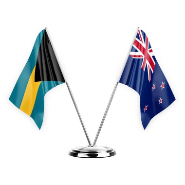 Two table flags isolated on white background 3d illustration, bahamas and new zealand