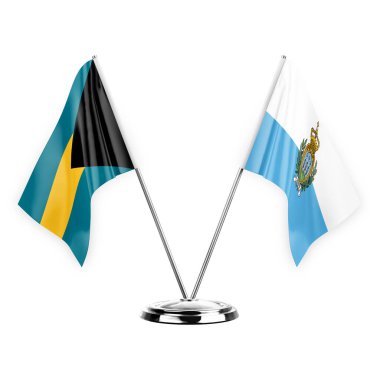 Two table flags isolated on white background 3d illustration, bahamas and san marino