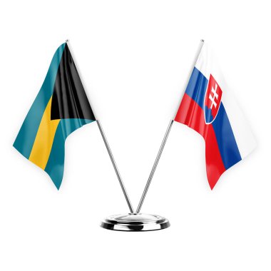Two table flags isolated on white background 3d illustration, bahamas and slovakia