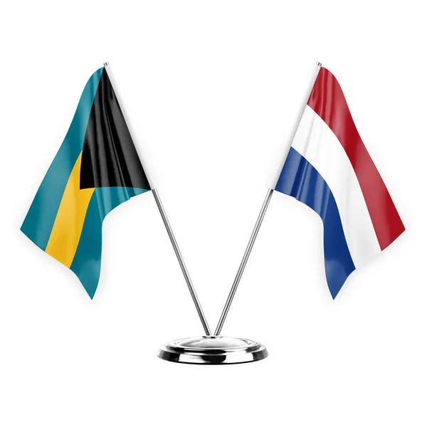 白い背景の3Dイラスト バハマとオランダに隔離された2つのテーブルフラグ — ストック写真