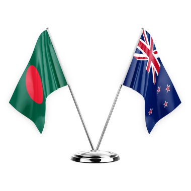 Two table flags isolated on white background 3d illustration, bangladesh and new zealand