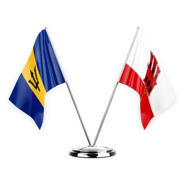Two table flags isolated on white background 3d illustration, barbados and gibraltar