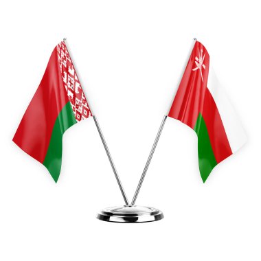 Two table flags isolated on white background 3d illustration, belarus and oman