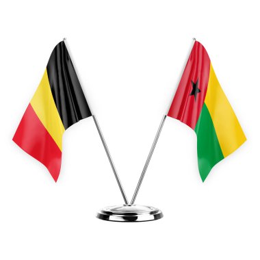Two table flags isolated on white background 3d illustration, belgium and guinea-bissau