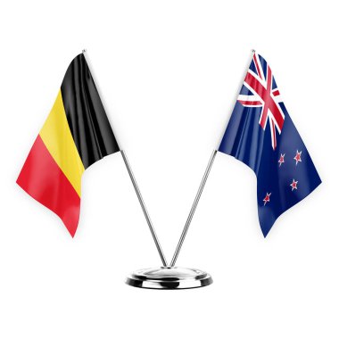 Two table flags isolated on white background 3d illustration, belgium and new zealand
