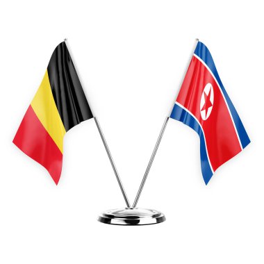 Two table flags isolated on white background 3d illustration, belgium and north korea