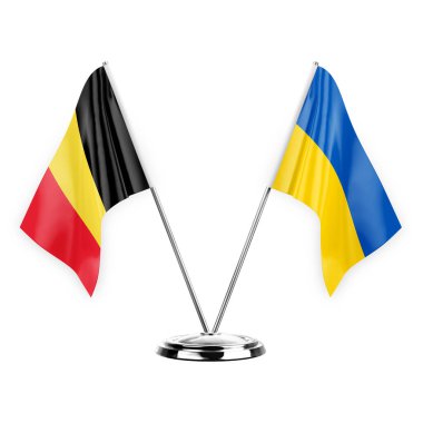 Two table flags isolated on white background 3d illustration, belgium and ukraine