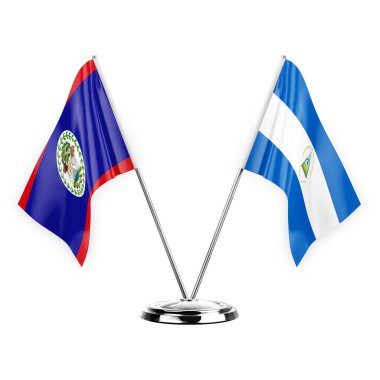 Two table flags isolated on white background 3d illustration, belize and nicaragua