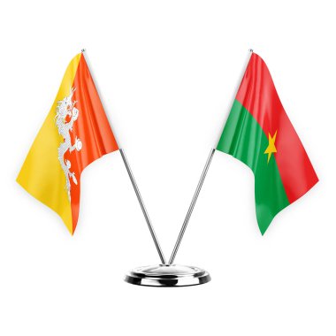 Two table flags isolated on white background 3d illustration, bhutan and burkina faso