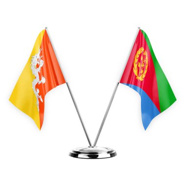 Two table flags isolated on white background 3d illustration, bhutan and eritrea