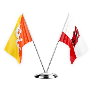 Two table flags isolated on white background 3d illustration, bhutan and gibraltar