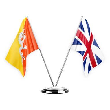 Two table flags isolated on white background 3d illustration, bhutan and britain
