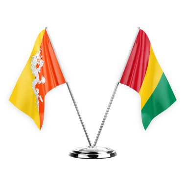 Two table flags isolated on white background 3d illustration, bhutan and guinea