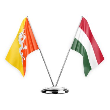 Two table flags isolated on white background 3d illustration, bhutan and hungary