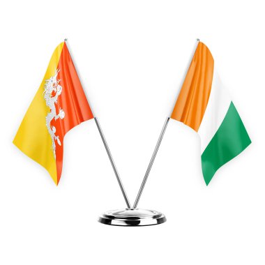 Two table flags isolated on white background 3d illustration, bhutan and ivory coast