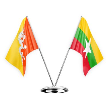 Two table flags isolated on white background 3d illustration, bhutan and myanmar